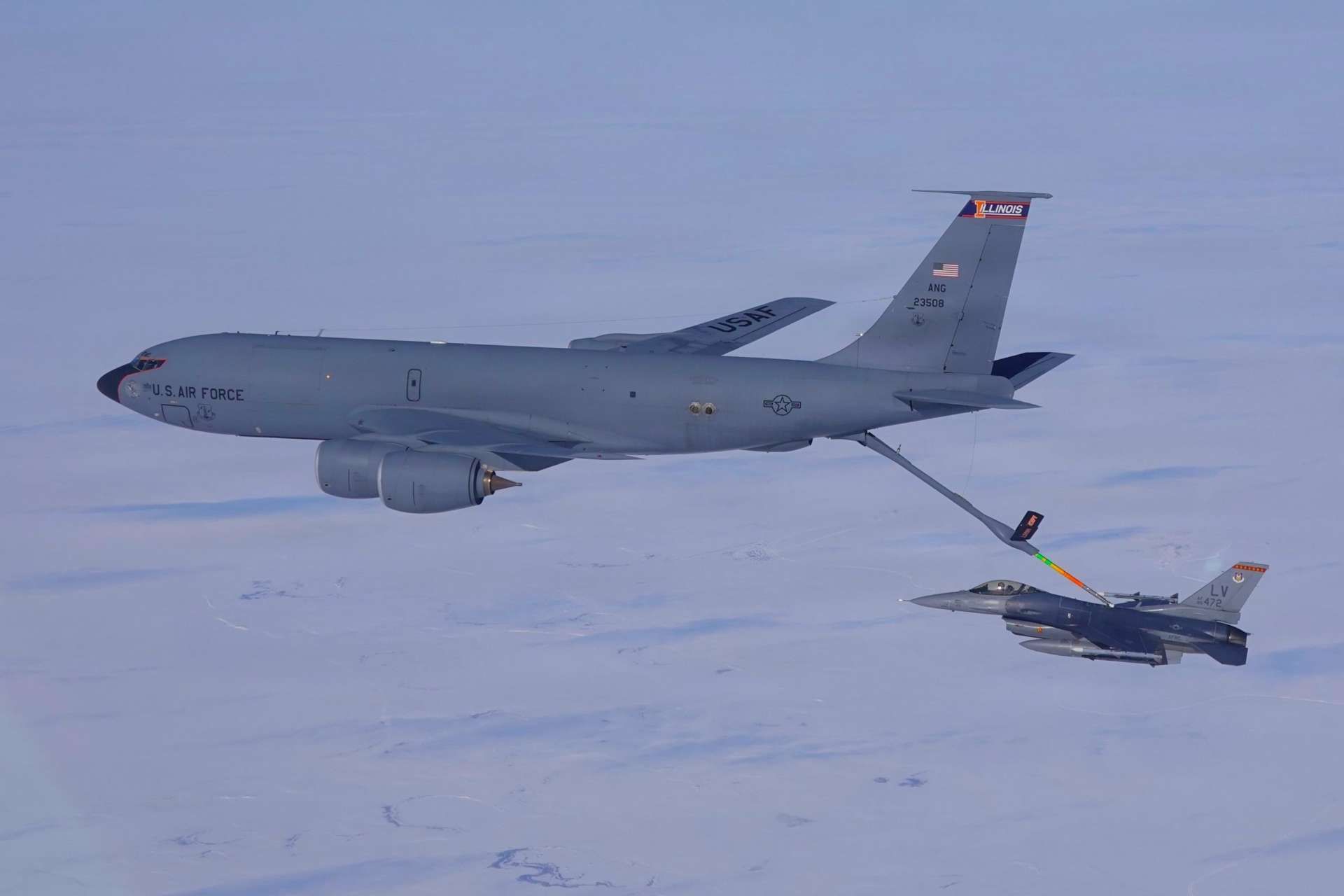A North American Aerospace Defense Command F-16 Fighting Falcon assigned to the 18th Fighter Interceptor Squadron receives fuel from a KC-135 Stratotanker while flying with other aircraft near King Salmon, Alaska, April 2, 2026 (Picture Source: U.S. Department of War)