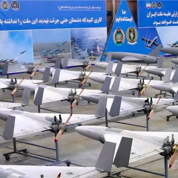Iranian mass-produced attack drones prepared for launch, illustrating Tehran’s shift toward high-volume unmanned warfare to saturate U.S. and allied air defense systems during the ongoing 2025–2026 conflict.