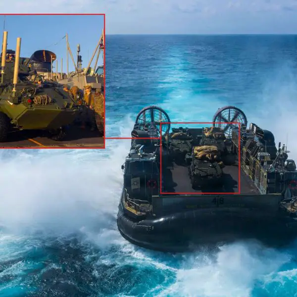 U.S. Navy LCAC launched from USS Boxer carrying three Marine Corps LAV-25 reconnaissance vehicles during South China Sea operations, showcasing the ability of forward-deployed amphibious forces to rapidly project mechanized combat power ashore in a contested Indo-Pacific environment (Picture Source: U.S. Navy)