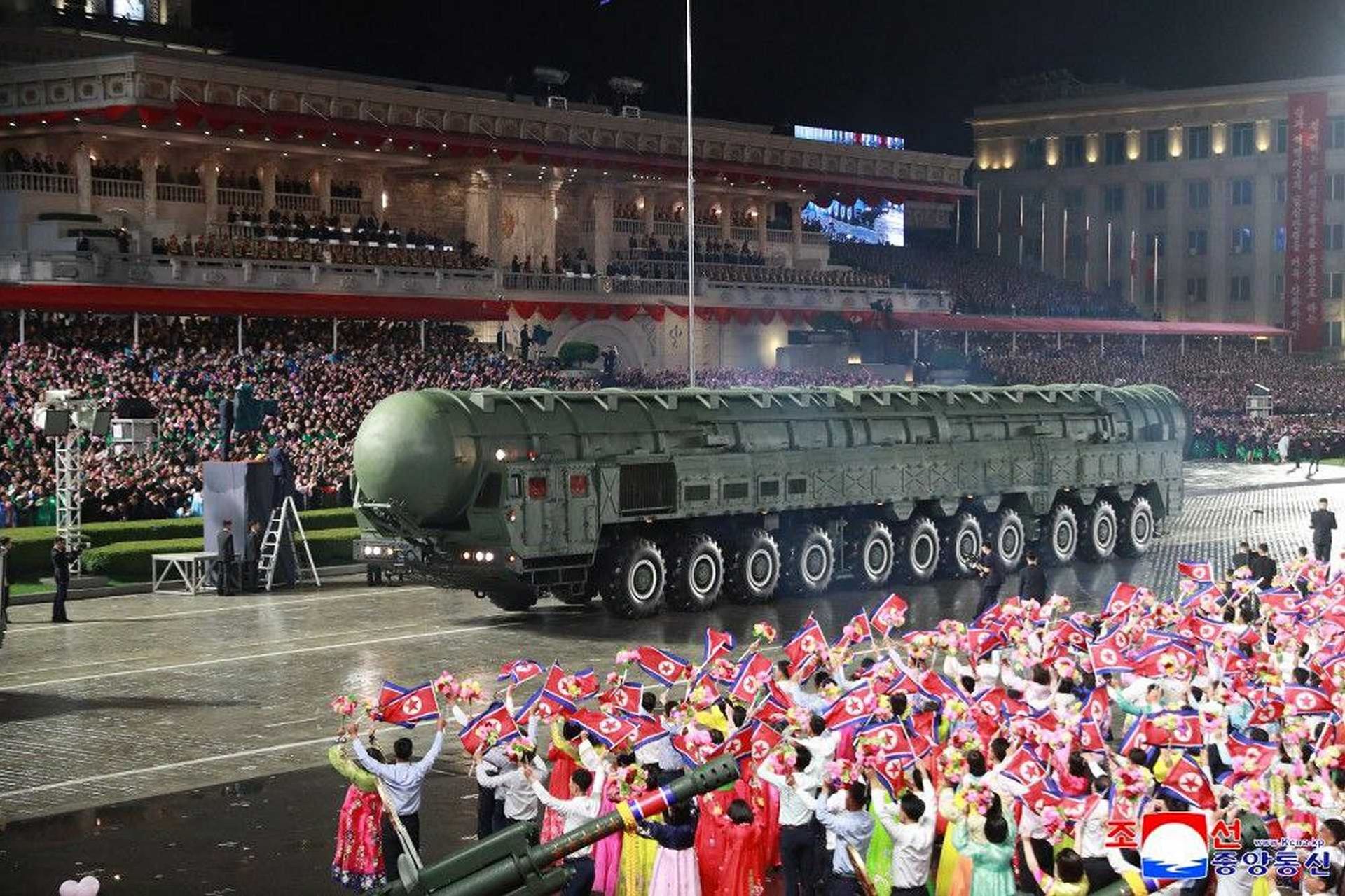 The Hwasong 20 intercontinental ballistic missile moves through central Pyongyang during North Korea’s October 2025 military parade, carried on an enlarged transporter launcher that analysts say underscores the regime’s push for greater range, mobility, and nuclear survivability.