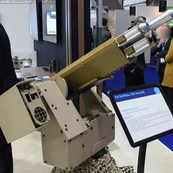 FN Herstal and Thales Belgium display the FN DeFNder Medium+ Remote Weapon Station fitted with a FZ605 five-tube 70 mm rocket launcher at BEDEX 2026 in Brussels (Picture source: Army Recognition)