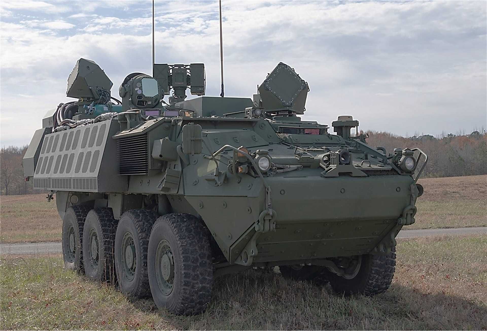 U.S. Army DE M-SHORAD Stryker vehicle equipped with a high-energy laser system engages unmanned aerial threats, illustrating the United States’ push to deploy directed energy weapons for cost-effective counter-drone defense.