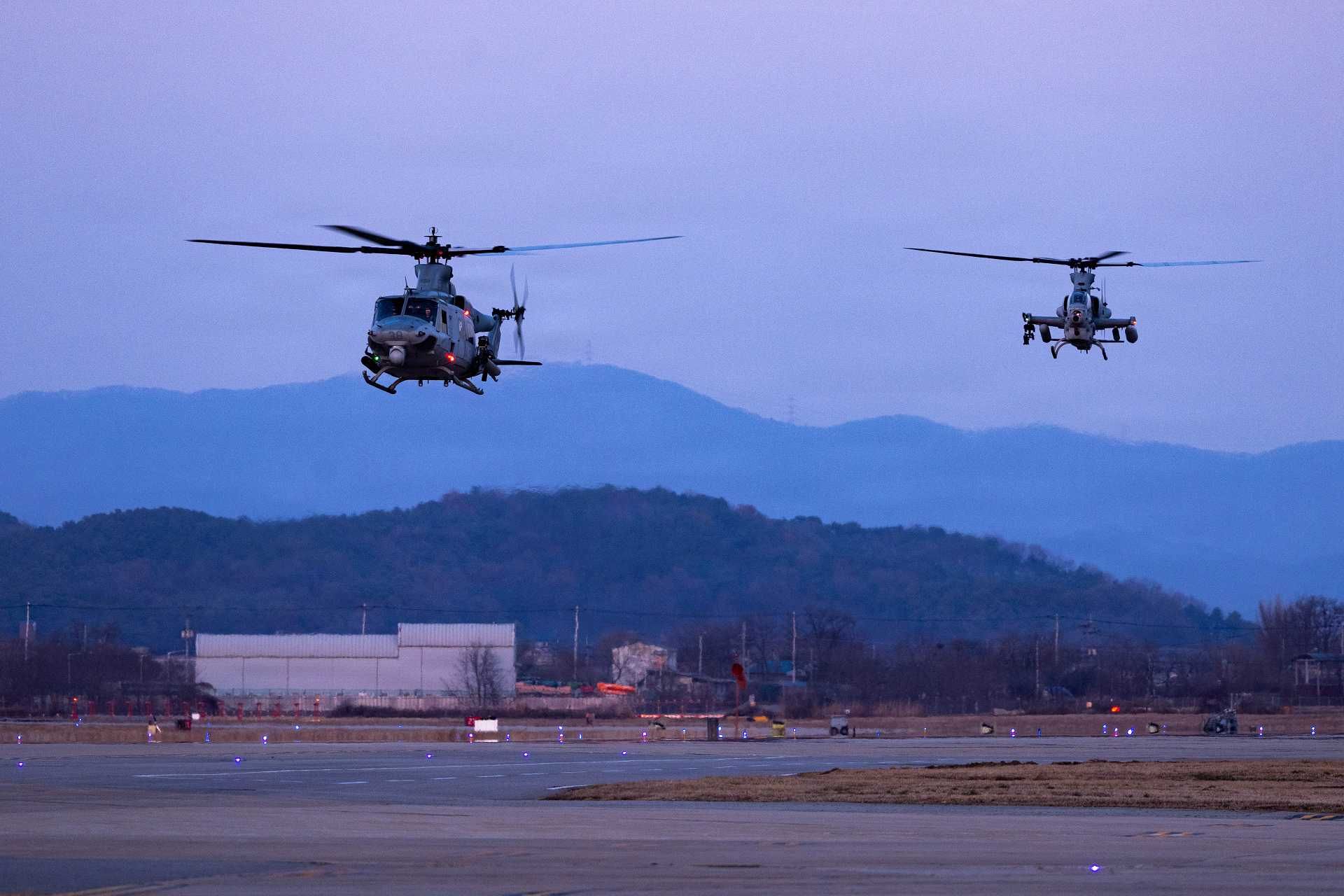 U.S. Marines assigned to Marine Light Attack Helicopter Squadron 369, Marine Aircraft Group 36, 1st Marine Aircraft Wing, arrive at Osan Air Base, Gyeonggi-do, South Korea, on March 19, 2026, to support Korea Marine Exercise Program (KMEP) 26.1.