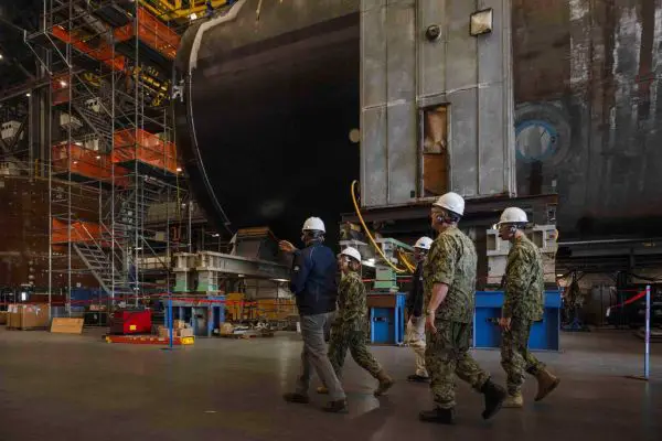 Vice Chief of Naval Operations Adm. Lisa Franchetti tours General Dynamics Electric Boat’s Quonset Point facility in Rhode Island, where modular construction and outfitting operations support future Virginia-class and Columbia-class submarines as the U.S. Navy accelerates AI-enabled submarine production modernization.
