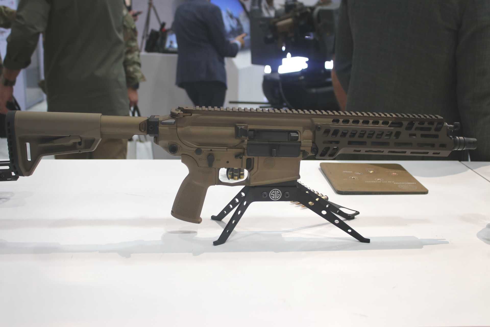 XM8 Carbine displayed by Sig Sauer at AUSA 2025, highlighting the U.S. Army’s next-generation lightweight 6.8mm weapon designed to enhance close combat mobility and lethality.