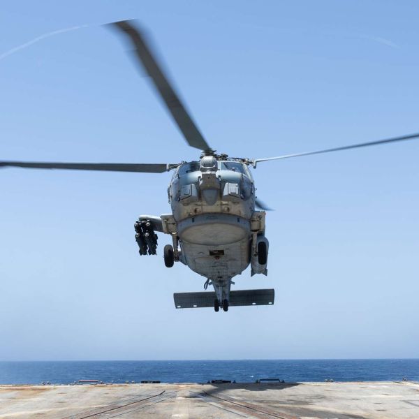 An MH-60R Seahawk from Helicopter Maritime Strike Squadron 50 lands aboard USS Truxtun in the Arabian Sea, where its sensors and precision weapons support U.S. blockade enforcement, maritime surveillance, and force protection near the Strait of Hormuz (Picture source: U.S. DoW).
