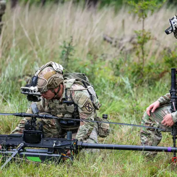 At Camp Beauregard, Louisiana, soldiers from Sioux Company, Multi-Purpose Company, 3rd Brigade, 10th Mountain Division, prepare to launch a Ghost-X Medium-Range Reconnaissance drone while operating the Soldier Borne Mission Command Surrogate system during a field training exercise.
