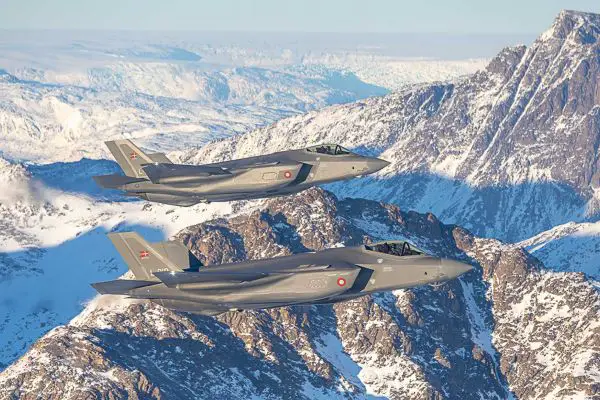 A Royal Danish Air Force F-35A Lightning II fighter jet in flight over the North Atlantic during Operation Noble Defender, conducting Arctic air surveillance under NORAD command.