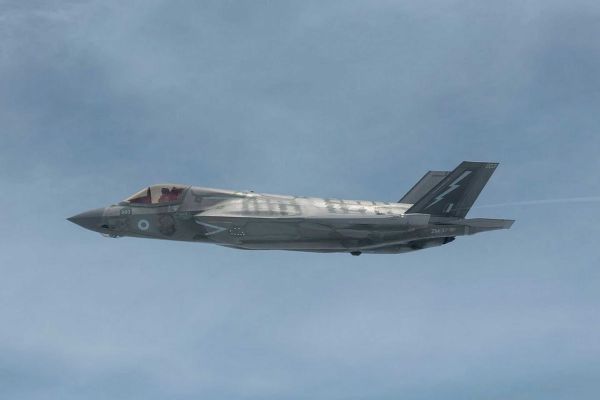 British Royal Navy F-35B Lightning II stealth fighter aircraft during flight operations, illustrating the aircraft selected to carry the future MBDA SPEAR long-range precision strike missile capability for the United Kingdom.