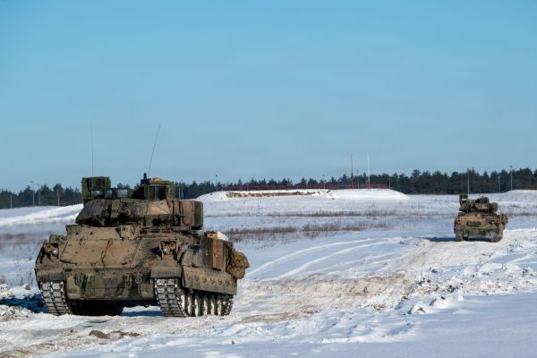 U.S. Soldiers from 3rd Battalion, 8th Cavalry Regiment lead a formation of M2A3 Bradley Fighting Vehicles during a live-fire exercise at Bemowo Piskie Training Area, Poland, on Jan. 31, 2026.