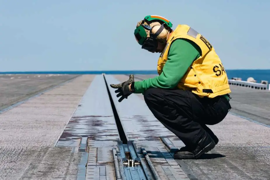Aviation Boatswain’s Mate (Equipment) 2nd Class Thomas Myers, from Smoaks, South Carolina, conducts a prelaunch inspection of the Electromagnetic Aircraft Launch System (EMALS) aboard the flight deck of USS Gerald R. Ford (CVN 78), the world’s largest and most advanced aircraft carrier. (Picture source: U.S. Department of War)
