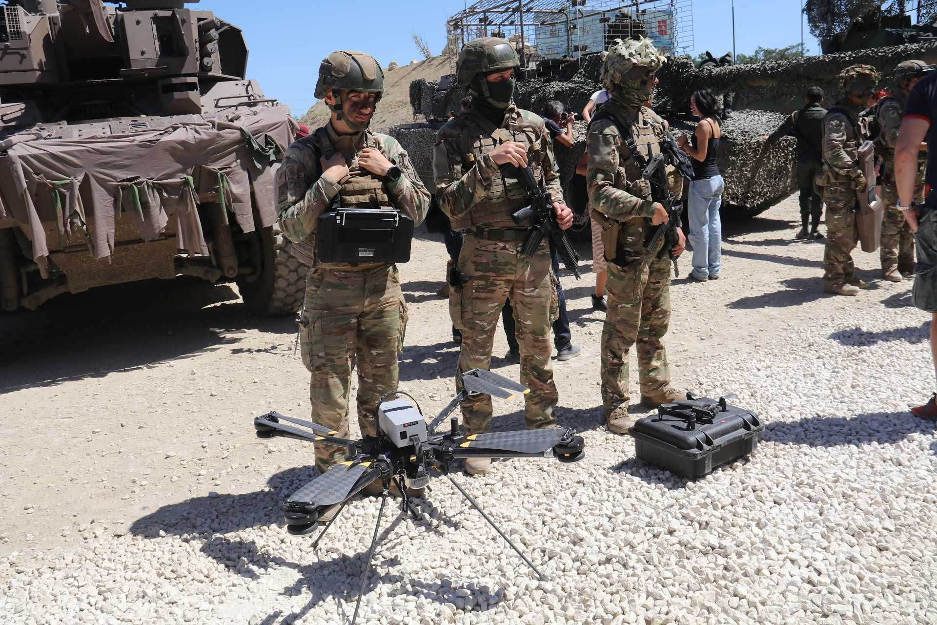 A French Army soldier stands in front of a tactical drone during a live demonstration at Eurosatory 2026 Press Day on June 14, 2026, highlighting France's ambition to field 20,000 military drones and expand unmanned capabilities across its armed forces. (Picture source: Army Recognition Group)