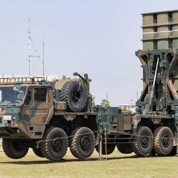 A Japan Ground Self-Defense Force Type-03 surface-to-air missile system during a live-fire drill. The system is set to undergo major upgrades under a new Ministry of Defense program aimed at countering ballistic and hypersonic missile threats.