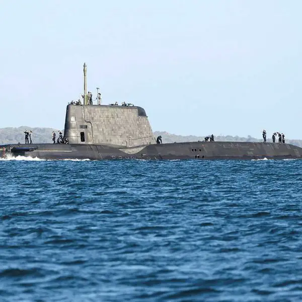 British Royal Navy Astute-class nuclear-powered attack submarine HMS Anson during operations at sea, representing the United Kingdom’s covert long-range strike and intelligence capability deployable toward the Middle East and within operational reach of Iran and the Strait of Hormuz.