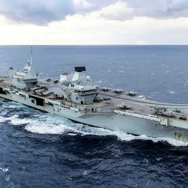 HMS Prince of Wales, the British Royal Navy’s flagship aircraft carrier, sails during carrier strike operations as the United Kingdom reduces its deployment readiness notice to five days, enabling faster power projection toward the Middle East amid rising regional tensions.
