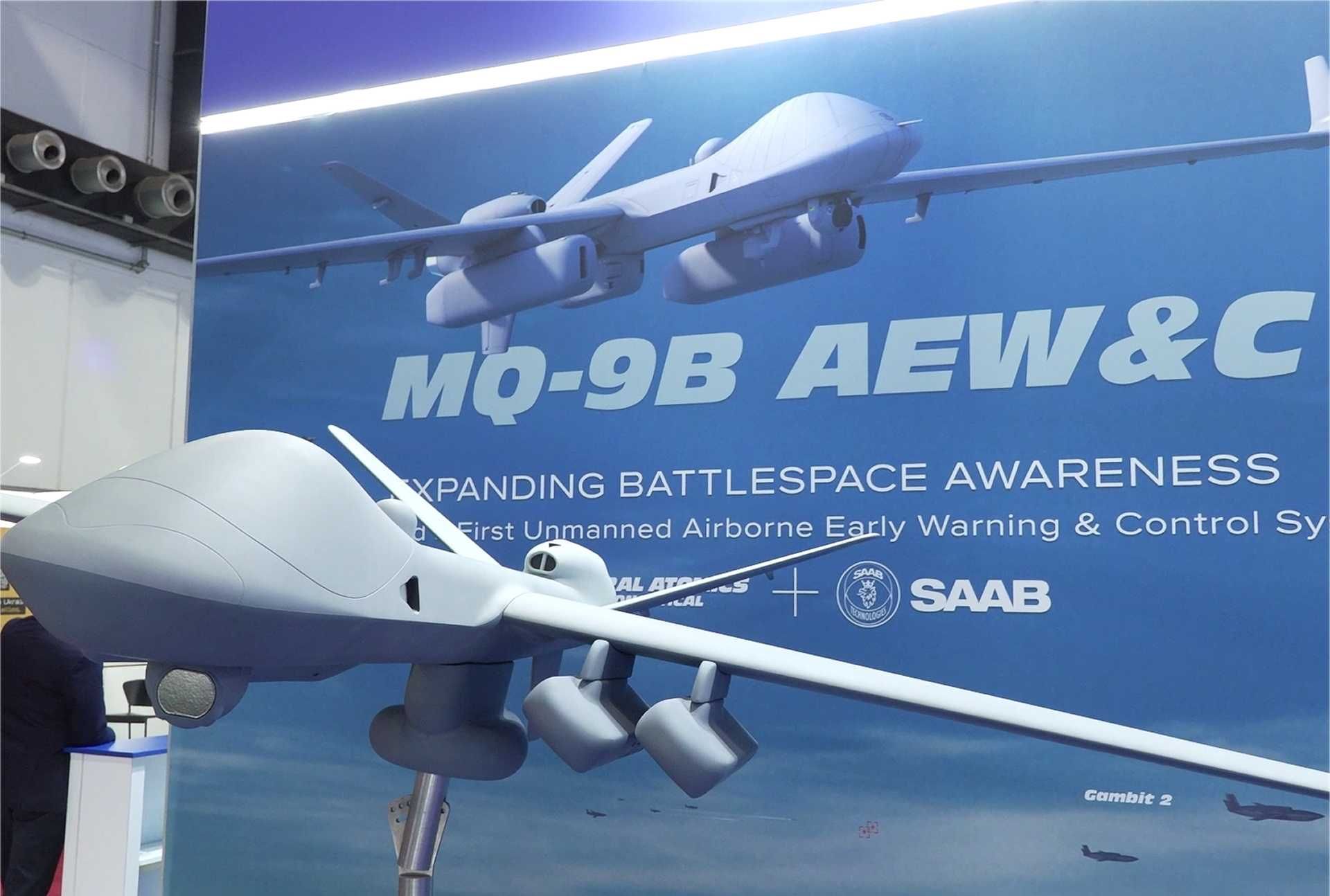 Scale model of the MQ-9B unmanned aircraft system configured for airborne early warning and control, showcased by General Atomics and Saab at BEDEX 2026, highlighting the expansion of UAV roles into battlespace management and networked operations.