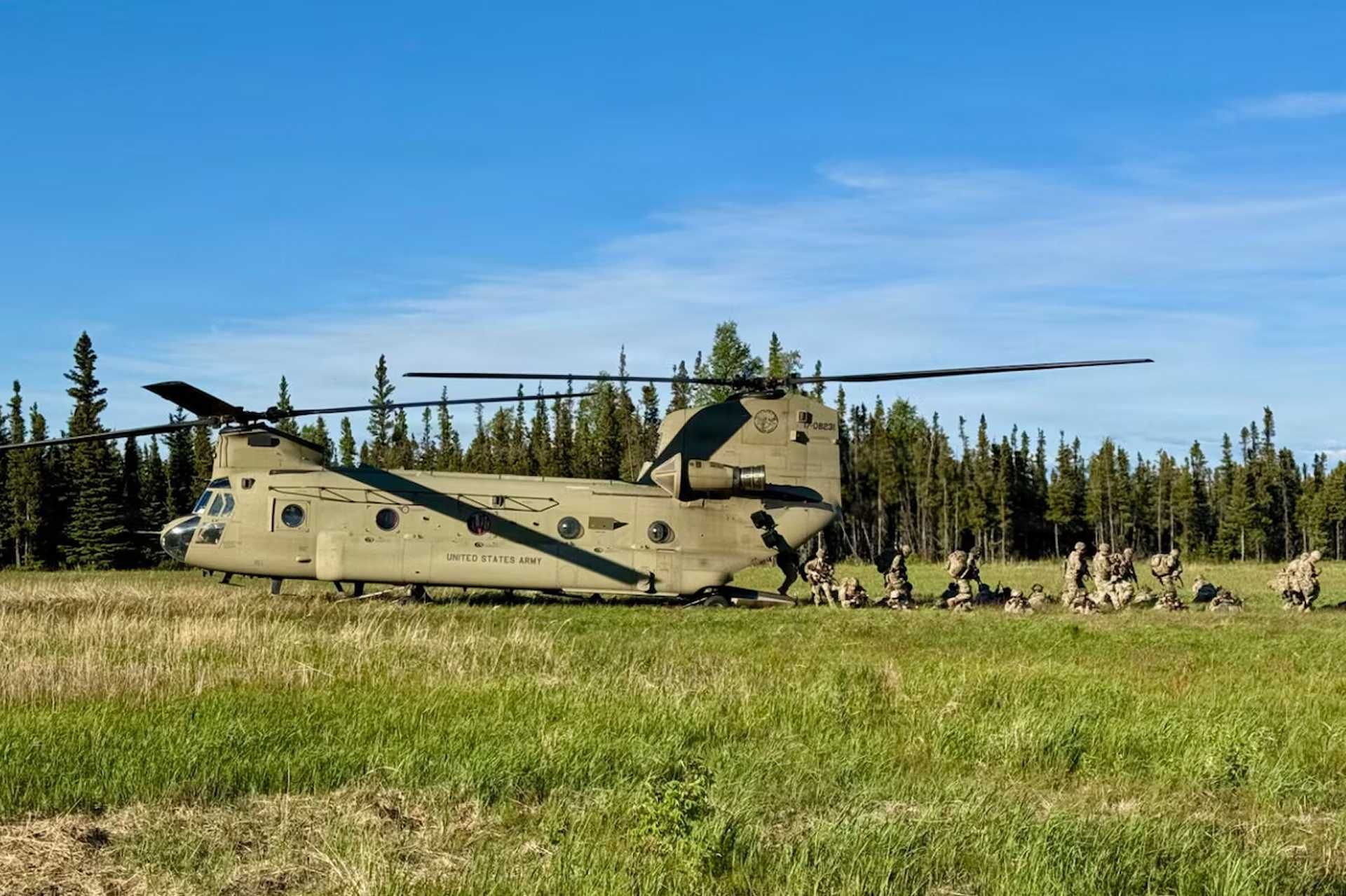 U.S. Army Soldiers from the 1st Squadron, 40th Cavalry Regiment conduct air assault operations during Exercise Red Flag-Alaska 26-2 at Donnelly Drop Zone near Fort Greely, Alaska, on June 10, 2026. The training supports the unit's transition into the 1st Battalion, 511th Parachute Infantry Regiment and strengthens airborne readiness for Arctic and Indo-Pacific missions.