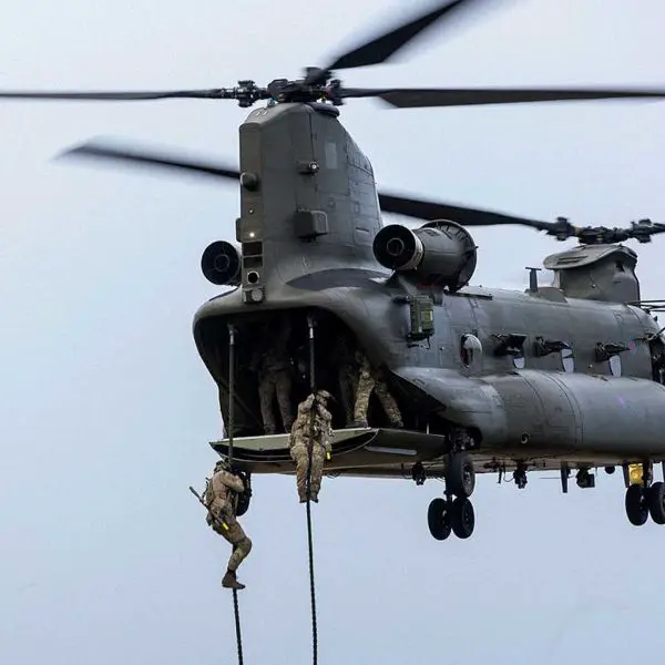 42 Commando British Royal Marines and soldiers from the 4th Battalion, Ranger Regiment (4 RANGER) of the British Army , insert by Britsih air Force Chinook HC6 helicopters and fast-rope onto the Otterburn Training Area in Northumberland to launch a simulated assault on an enemy position during Exercise Hyperion Storm.