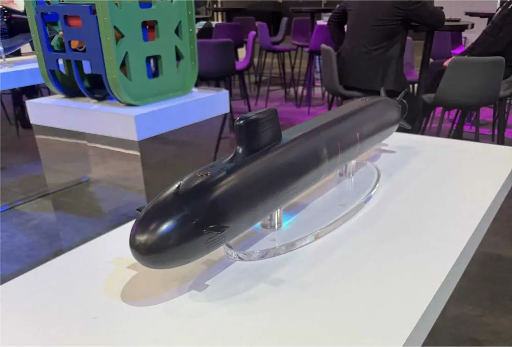 Scale models of the future SSN-AUKUS submarines displayed at the BAE Systems stand during INDOPAC 25, illustrating the joint UK-US-Australia design planned for delivery to the Royal Navy in the 2030s and the Royal Australian Navy in the 2040s.