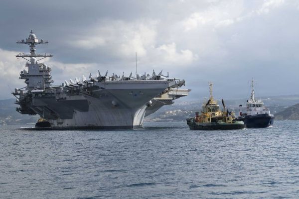 U.S. Navy USS Gerald R. Ford (CVN 78), the world’s largest aircraft carrier, conducts forward naval operations during a record deployment exceeding 300 days linked to combat operations against Venezuela and Iran. The Ford-class aircraft carrier became a central element of U.S. military power projection across multiple theaters, highlighting both the global reach and growing operational strain of the U.S. Navy amid simultaneous crises in the Caribbean and Middle East.