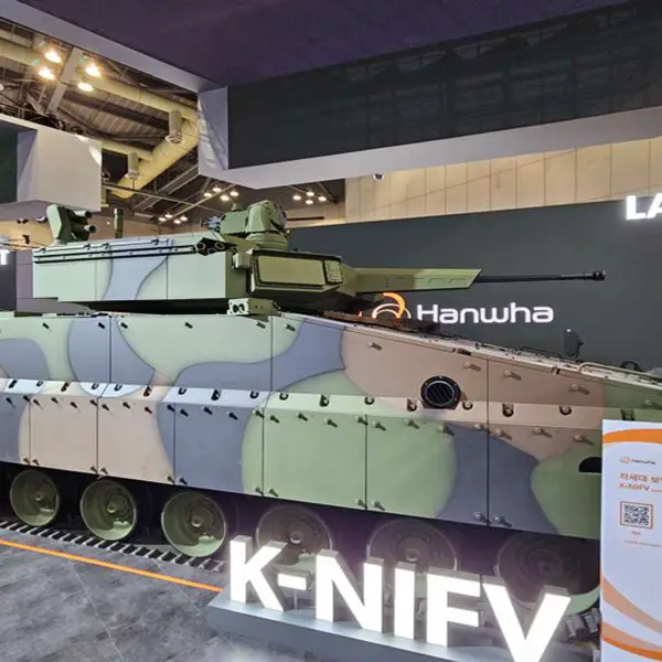 Hanwha’s K-NIFV is a Redback-derived IFV with an unmanned 30 mm turret (ATGM-ready), eight-troop capacity, and layered counter-drone plus APS protection (Picture source: Hanwha Aerospace).