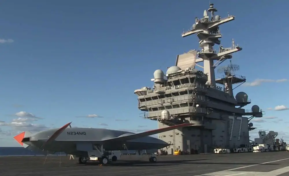 Boeing’s MQ-25 Stingray test aircraft conducts carrier deck operations aboard USS George H.W. Bush (CVN-77) in December 2021, marking a major milestone toward integrating autonomous aerial refueling drones into future U.S. Navy carrier air wings.