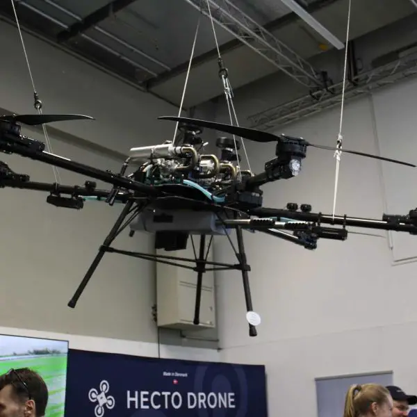Danish HD-606 heavy UAS armed with twin .50 cal DCR-50 machine guns displayed at Enforce Tac 2026 in Germany, marking the first heavy drone configured with large-caliber direct fire capability.