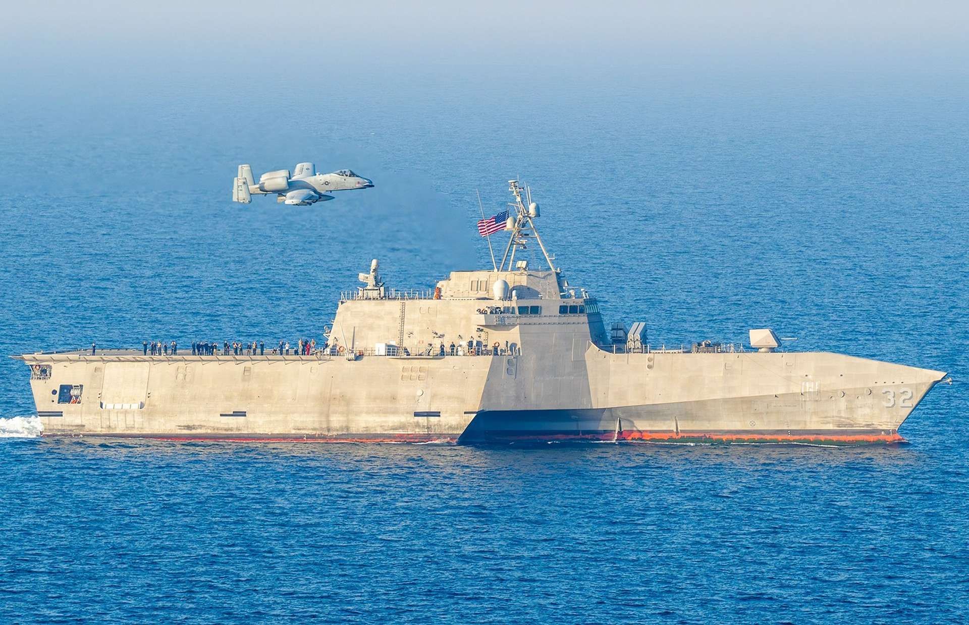 U.S. Air Force A-10C Warthogs fly armed overwatch for USS Santa Barbara (LCS 32) during an Arabian Gulf mine countermeasures drill, highlighting a joint strategy that pairs LCS-based unmanned mine hunting with persistent close air support to deter fast-boat, drone, and mining threats near the Strait of Hormuz (Picture source: U.S. DoW).