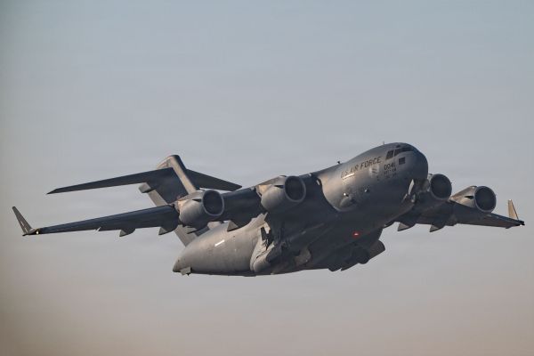 A C-17A Globemaster III takes off on 22 January 2026 during a readiness exercise conducted within the U.S. Central Command area of responsibility.