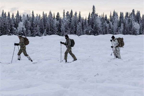 U.S. soldiers from 3rd Battalion, 10th Special Forces Group (Airborne) conduct cross-country ski mobility training across snow-covered terrain during cold weather operations preparation at Fort Wainwright, Alaska, on January 24, 2026, enhancing their ability to maneuver and sustain special operations in Arctic environments.