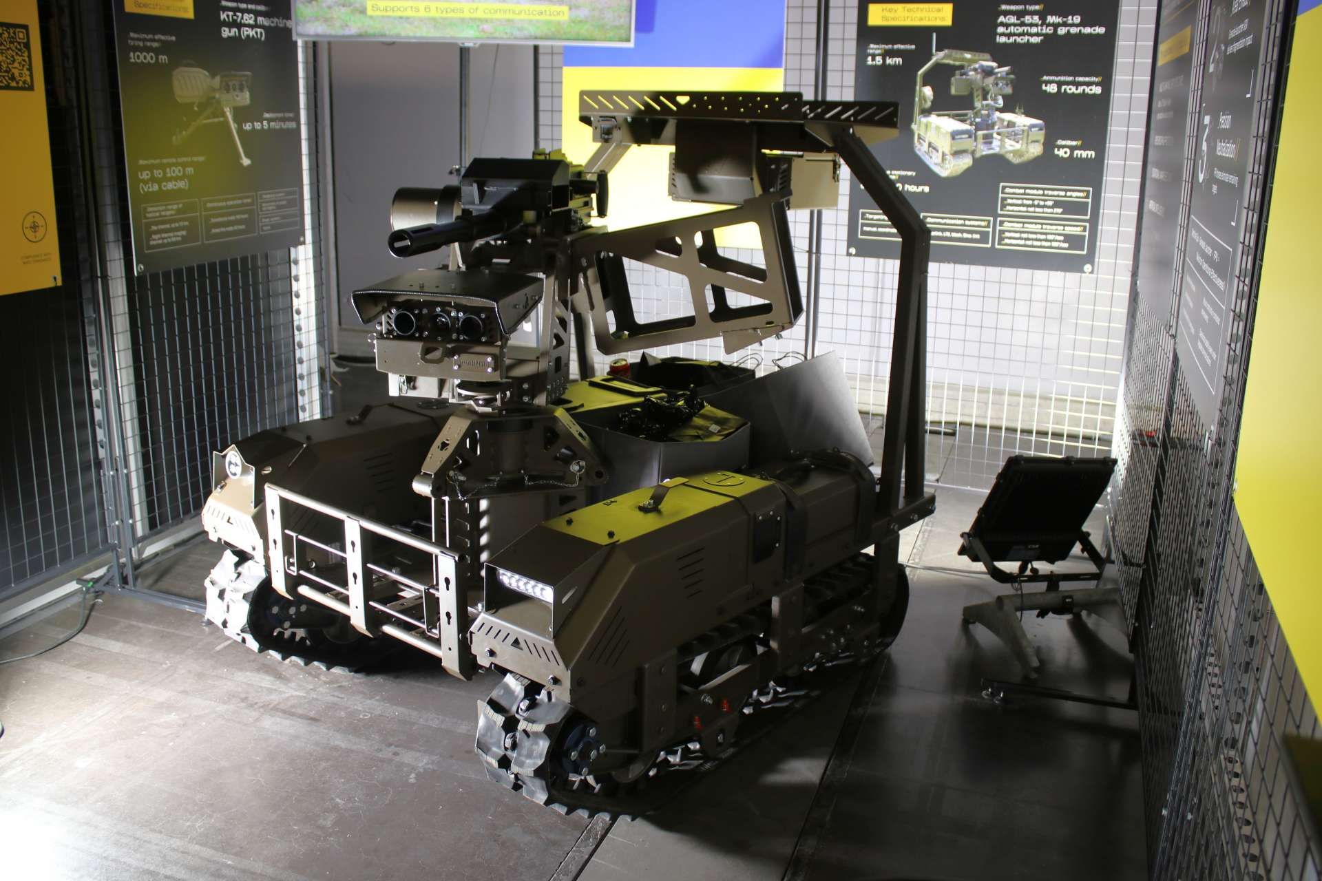 Ukrainian defense company DevDroid unveiled the Droid NW 40 unmanned ground vehicle at BEDEX 2026 in Brussels, showcasing a reconnaissance-strike robot armed with a remotely operated 40 mm grenade launcher designed to support European armies in high-risk combat environments (Picture Source: Army Recognition)
