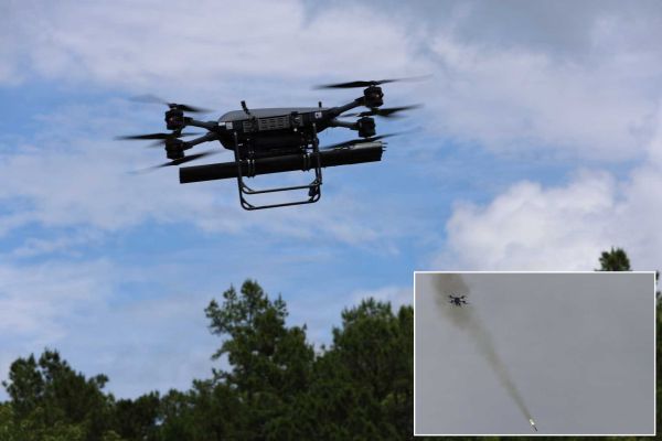 TRV-150 tactical resupply drone armed with a three-shot APKWS launcher launches a laser-guided 70 mm rocket during flight testing at Fort Rucker, Alabama, on May 20, 2026, demonstrating a new battalion-level precision-strike capability.