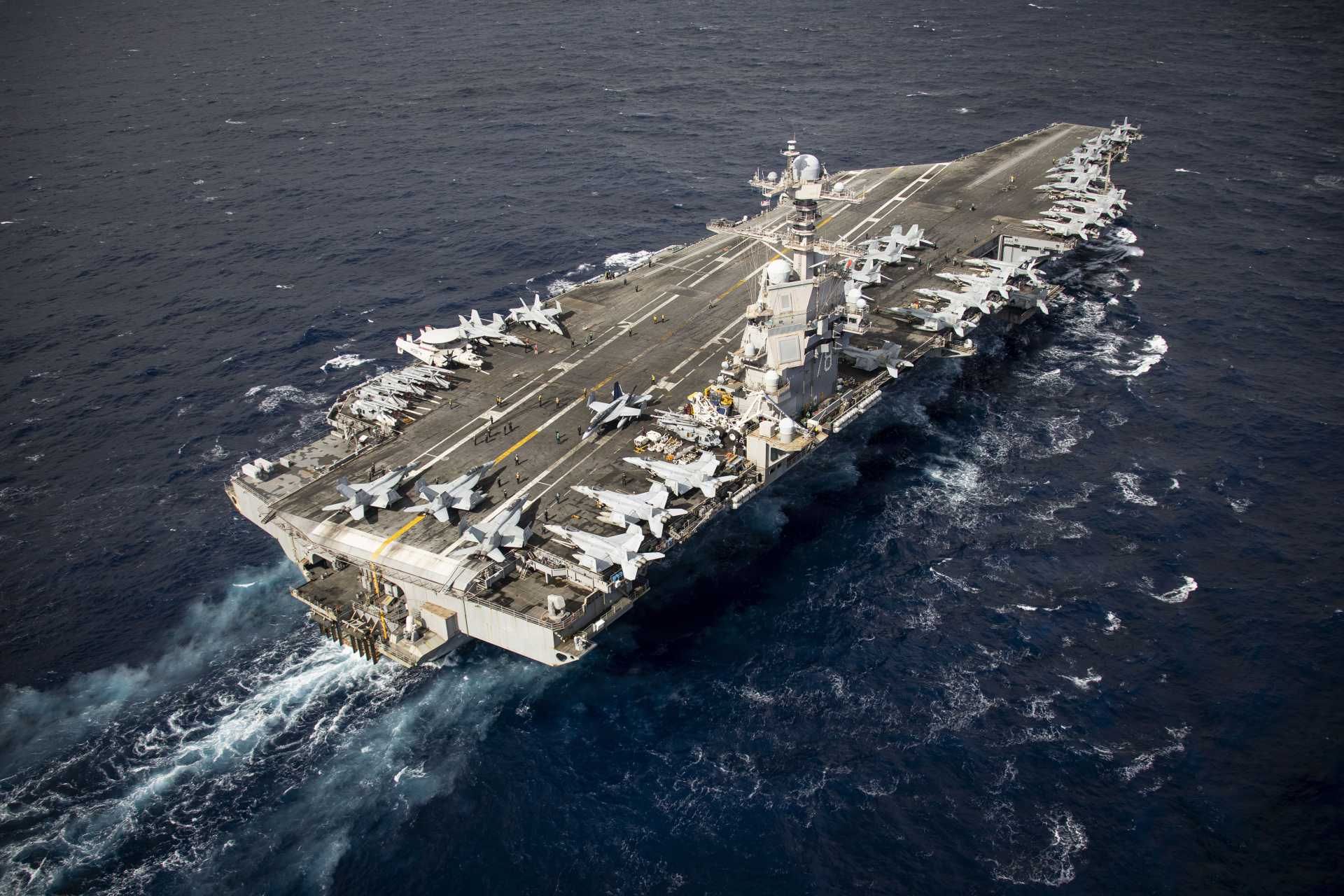 U.S. Navy sailors conduct flight deck operations aboard USS Gerald R. Ford (CVN-78) in the Eastern Mediterranean Sea on March 22, 2026, illustrating the high-tempo air operations capability supporting U.S. multi-carrier deployments.