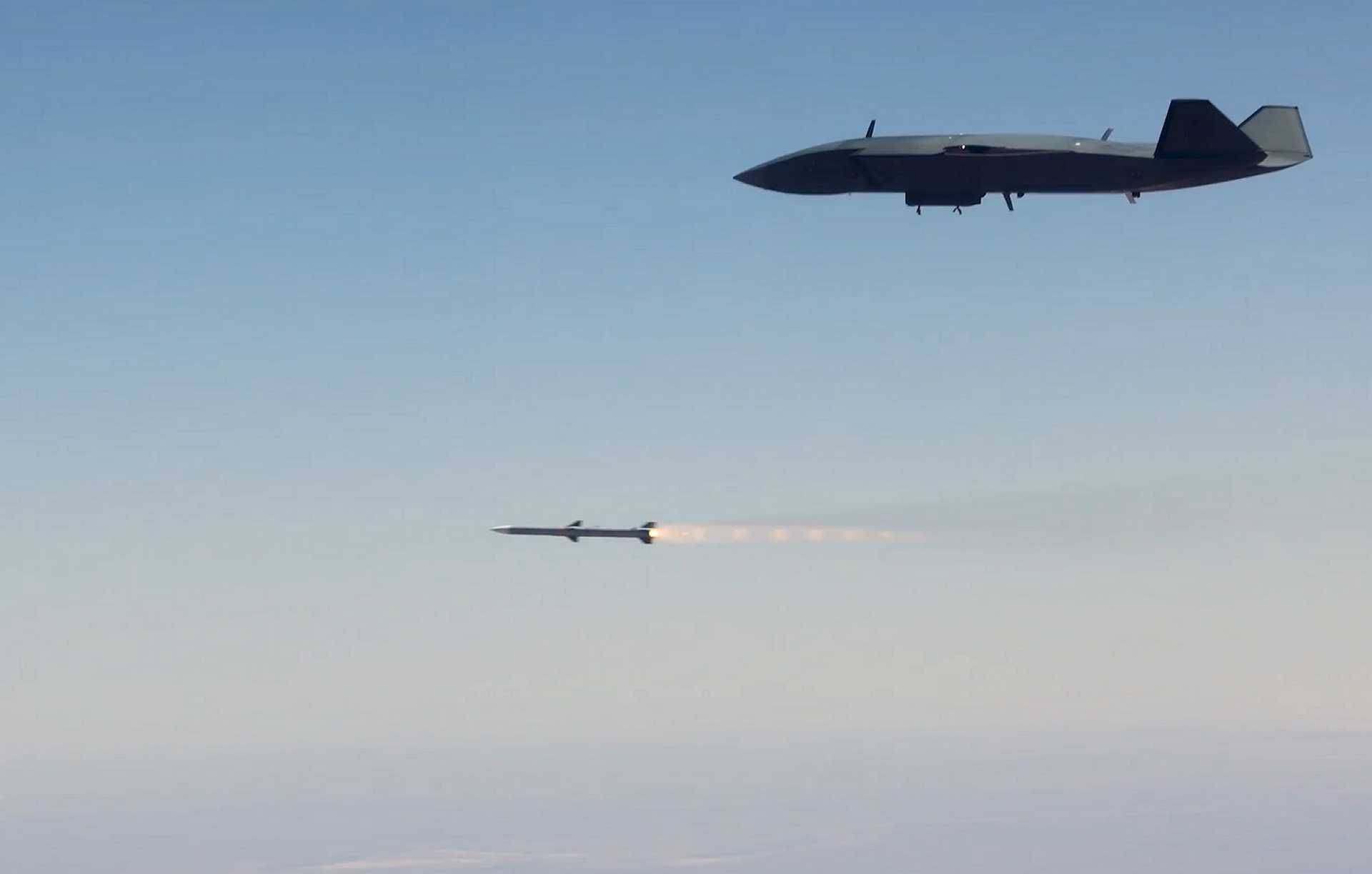 The MQ-28 Ghost Bat launches a missile during a December 2025 engagement demonstration, marking a major milestone as the Australian uncrewed aircraft executes an active combat role within a manned-unmanned air combat formation.