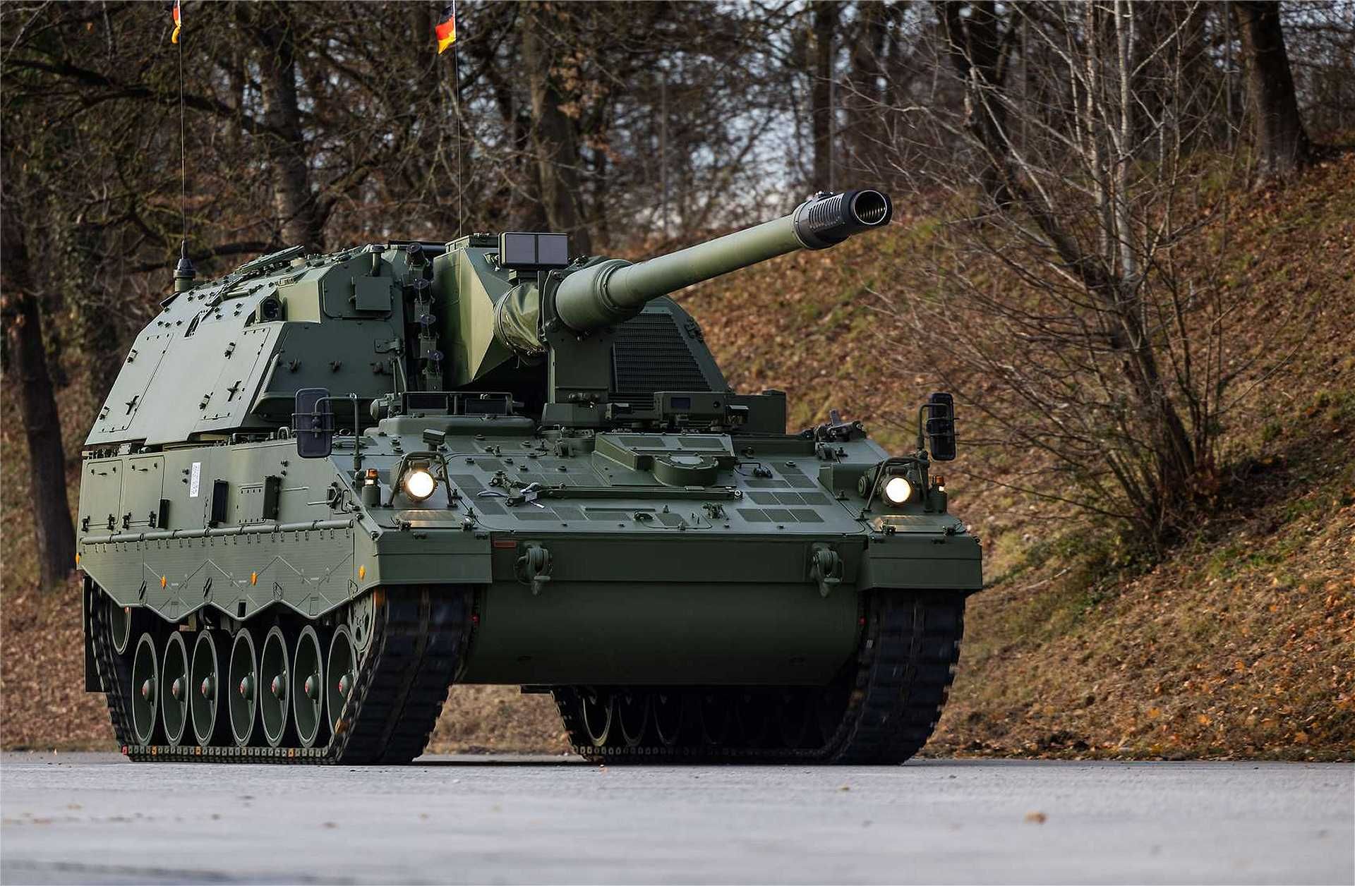 The newly unveiled PzH 2000 A4 155mm self-propelled howitzer on display at the KNDS Deutschland facility in Munich, featuring the advanced fire control system and upgraded digital architecture for enhanced battlefield performance.