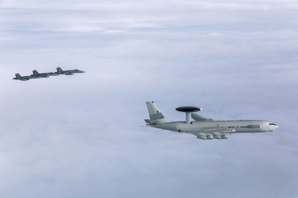 A NATO E-3A AWACS aircraft conducted its first operational mission over Finland, escorted by Finnish Air Force F/A-18 Hornets, marking a key step in integrating Finland into NATO’s airborne command and air defense network (Picture Source: Finnish Air Force)