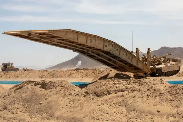 U.S. Army Joint Assault Bridge vehicles under a new $44.98 million DRS Sustainment Systems contract will expand protected gap-crossing capability, allowing Abrams-led armored formations to breach obstacles and maintain momentum in high-intensity combat (Picture source: U.S. DoW).