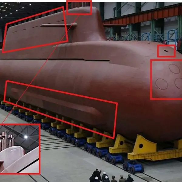 North Korea’s 8,700-ton submarine, described as a nuclear-powered guided missile platform, would represent a major leap in size and capability, potentially enabling longer, stealthier patrols and a more survivable sea-based nuclear force, though its propulsion and operational maturity remain uncertain (Picture Source: North Korean State Media Agency)