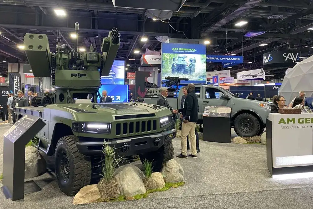 AM General’s combat-ready UGV displayed at Modern Day Marine integrates a Moog RIwP remote turret with 30 mm gun and missile options, giving Marines an autonomous vehicle for resupply, reconnaissance, counter-drone defense, and high-risk missions in contested environments (Picture source: AM General).
