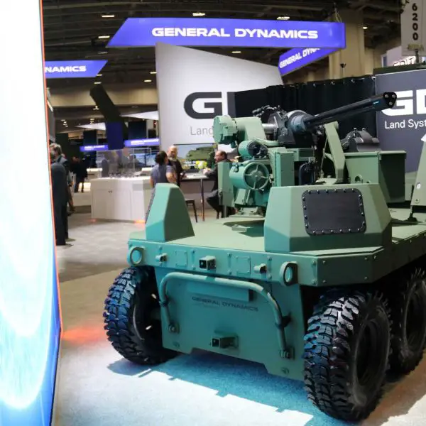 The new General Dynamics MUTT XM robotic vehicle showcased at AUSA 2025 features a Kongsberg RS6 weapon station armed with an XM915 20mm Gatling gun, highlighting its counter-UAS capability and advanced autonomous mobility for future U.S. Army missions.