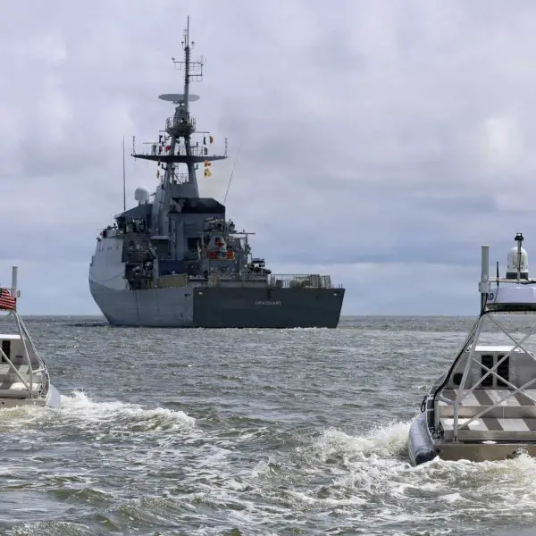 Global Autonomous Reconnaissance Craft (GARC) unmanned surface vessels maneuver alongside the Brazilian Navy Amazonas-class offshore patrol vessel Araguari (P122) during a robotic and autonomous systems demonstration conducted by U.S. Navy Task Force 66 as part of Exercise Obangame Express 2026 in Douala, Cameroon.
