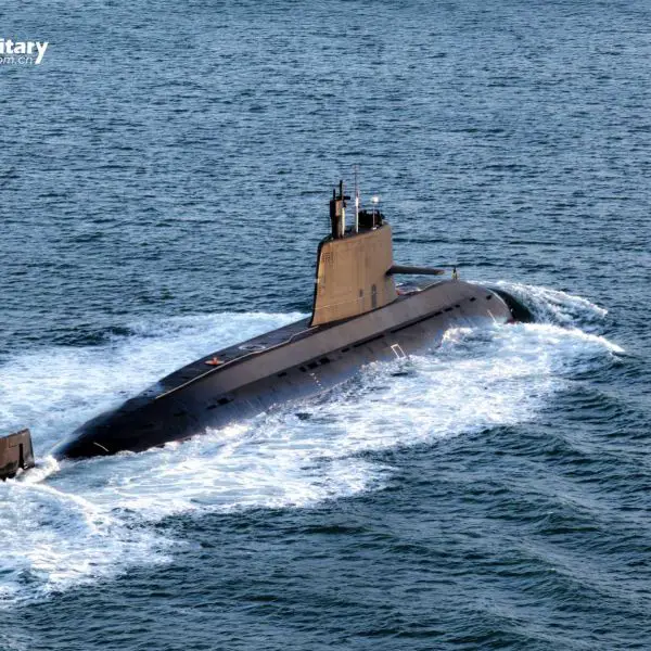 A Chinese People’s Liberation Army Navy nuclear-powered submarine sails during naval operations as China advances nuclear clock technology that could allow future submarines to navigate with extreme precision without GPS, potentially challenging U.S. Navy anti-submarine warfare dominance in the Indo-Pacific region.