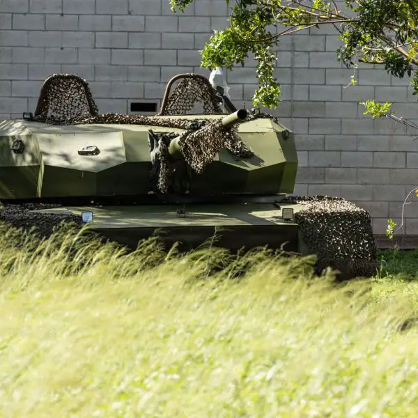 An opposing force tank simulation set occupies a battle position during Joint Pacific Multinational Readiness Center Rotation 26-01 at Kahuku Training Area, Hawaii, on Nov. 11, 2025.