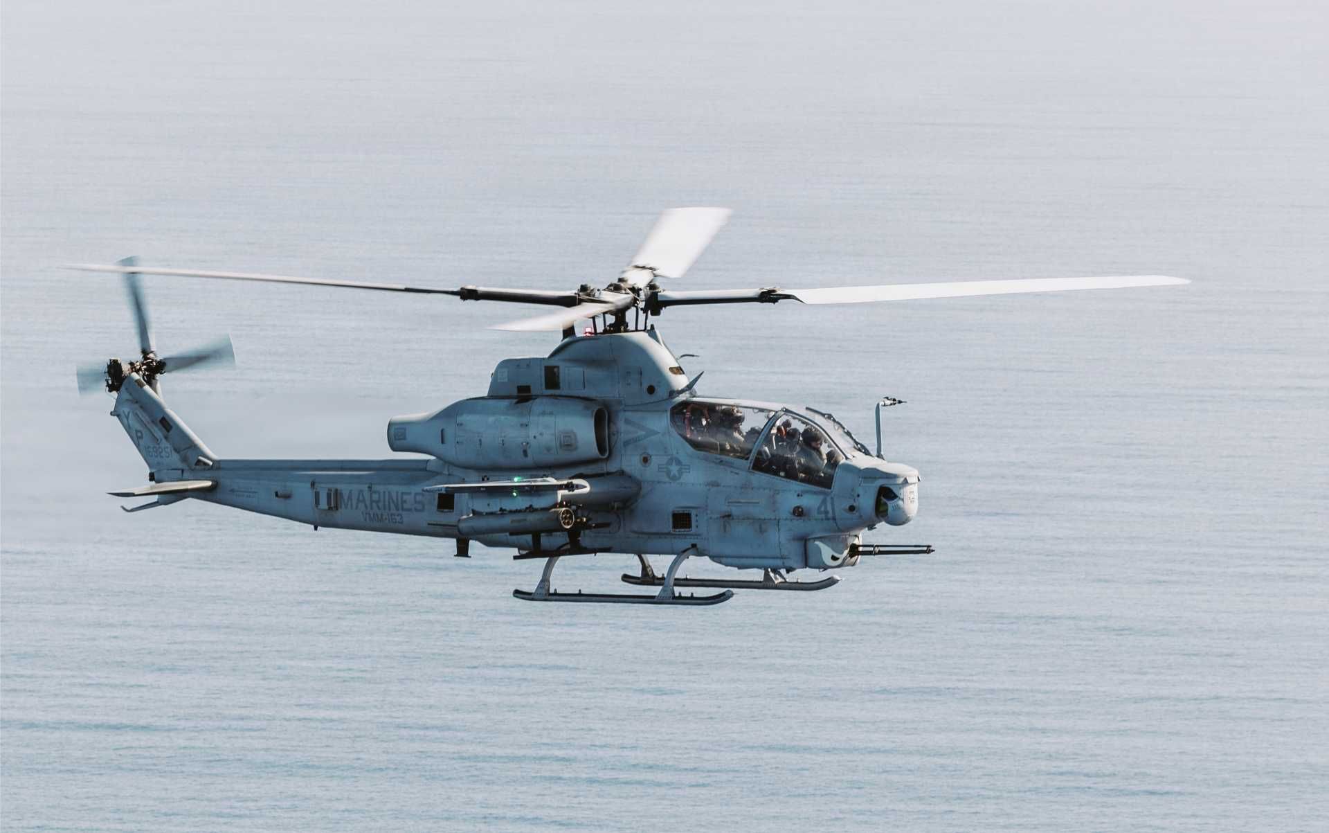 A U.S. Marine Corps AH-1Z Viper gunship assigned to Marine Medium Tiltrotor Squadron 163 (Reinforced), part of the 11th Marine Expeditionary Unit, conducts a flight over the Pacific Ocean on January 23, 2026.