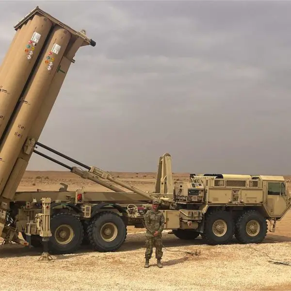 A U.S. Army THAAD air defense missile system launcher during operational readiness training. The FY2026 defense acquisition plan funds the procurement of 25 new interceptors, key obsolescence-mitigation efforts, and the modernization of battery ground components to maintain long-range missile defense capability against advanced threats.
