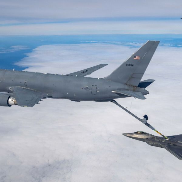 A KC-46 Pegasus from the 418th Flight Test Squadron refuels an F-22 Raptor while an F-35A waits its turn over the Pacific Test Range on November 5, 2025. (Picture source: US DoD)
