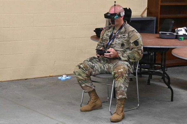 Chief Warrant Officer 2 Nathan Shea, Unmanned Aircraft Systems Operations Officer at the Fort Indiantown Gap UAS Training and Innovation Facility, pilots a first-person-view (FPV) drone during a training session at Fort Indiantown Gap, Pennsylvania, on September 2, 2025.
