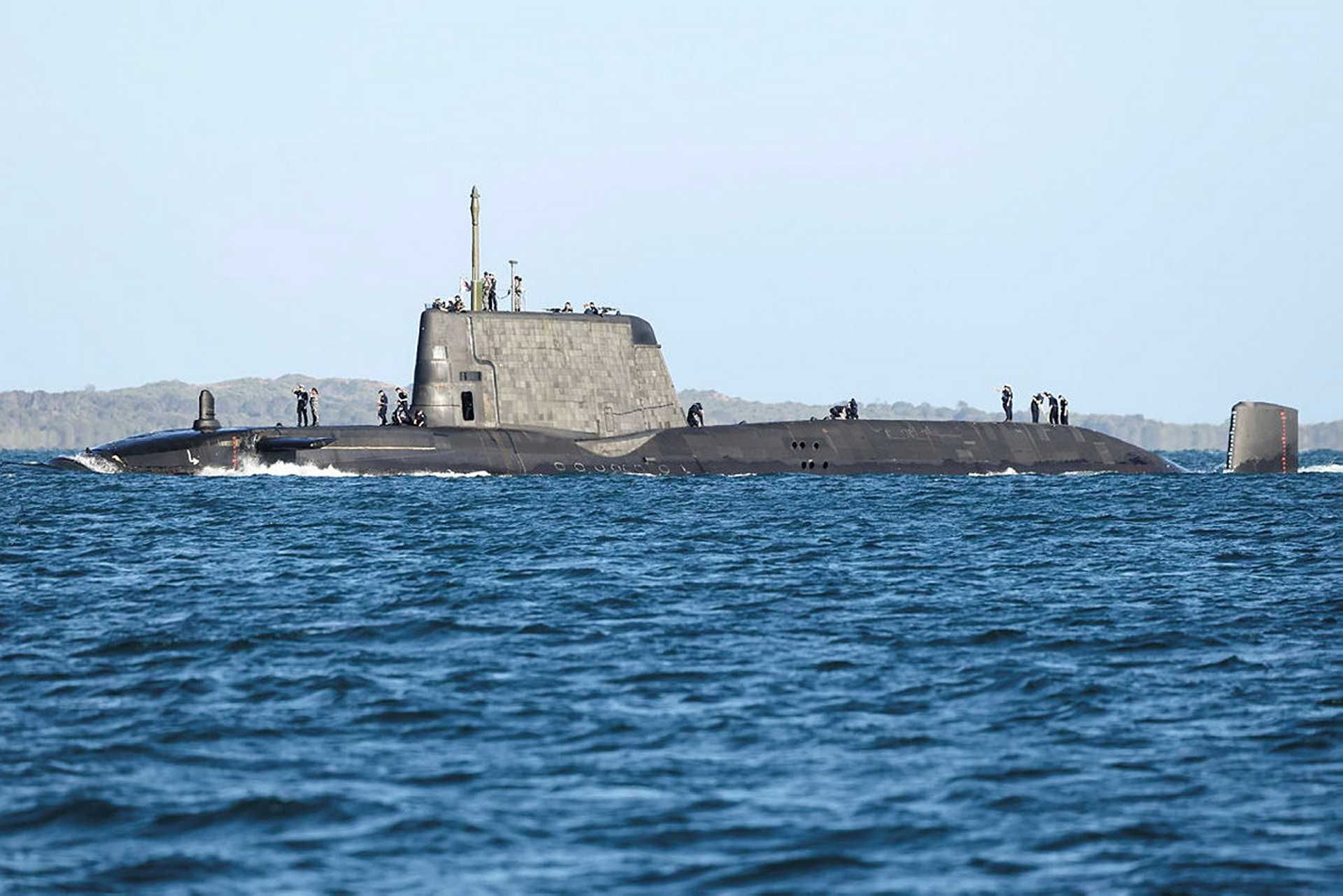 British Royal Navy Astute-class nuclear-powered attack submarine HMS Anson during operations at sea, representing the United Kingdom’s covert long-range strike and intelligence capability deployable toward the Middle East and within operational reach of Iran and the Strait of Hormuz.