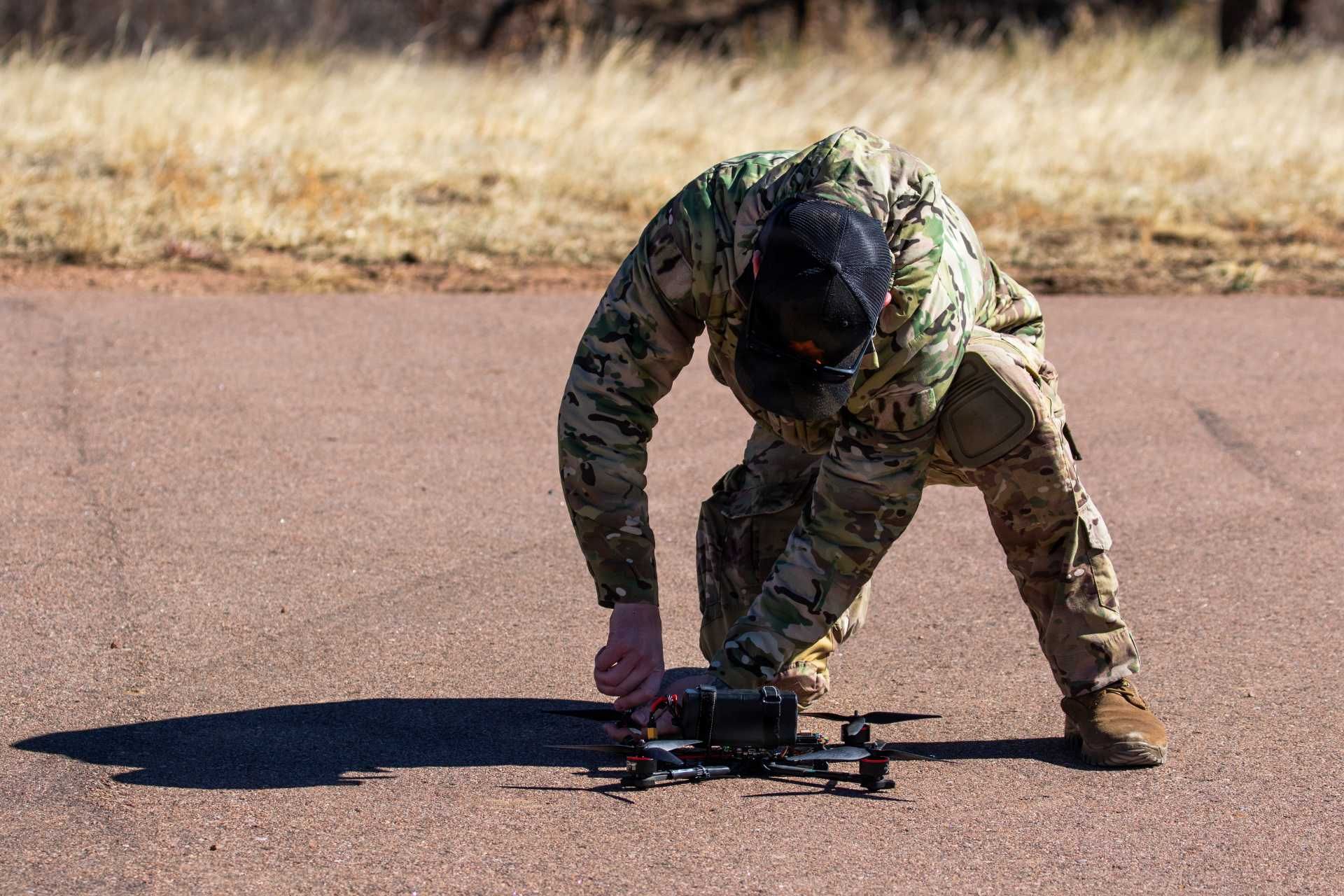 A Green Beret from the U.S. Army’s 10th Special Forces Group (Airborne) performs pre-flight inspections on a small unmanned aerial system during the Advanced Drone Course at Fort Carson, Colorado, on February 19, 2026.