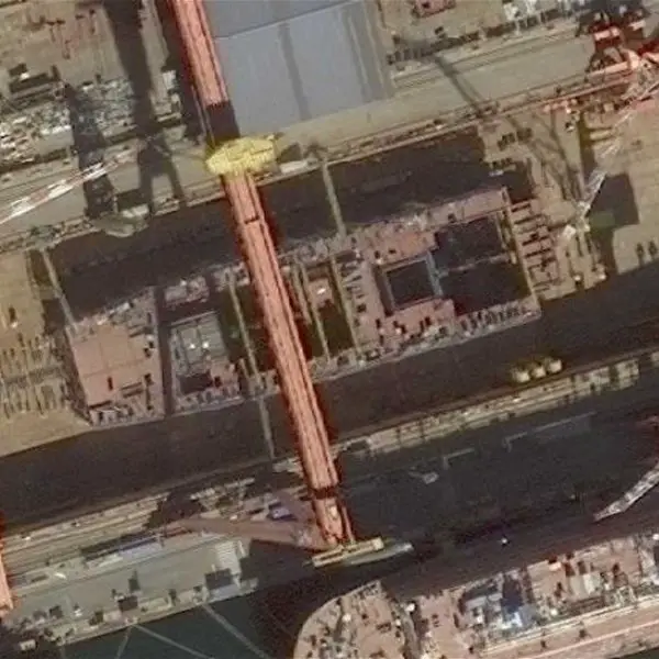 Satellite image published in December 2025 by PLA Military Updates on X shows China’s Type 004 nuclear aircraft carrier under construction at Dalian, with an estimated displacement of 110,000 to 120,000 tons and sea trials projected between mid-2028 and early 2029.